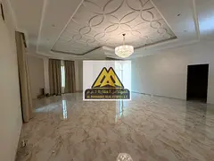 A distinctive villa for annual rent in Al Raqaib, Ajman, featuring spacious areas and a prime locati