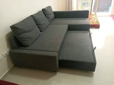 Grey L-shaped Sofa with  Bed  Good Condition