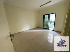 2BR Hall Al Qasimia Al Nad, spacious, balcony, 2 baths, central AC &amp; gas, prime location near se