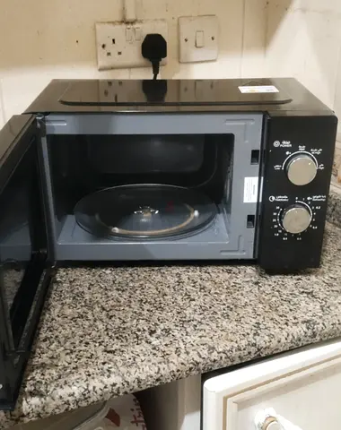 Compact Black Countertop Microwave — Good Working Condition