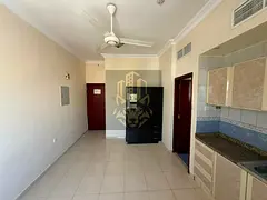 Apartment with one bedroom living room bathroom and two balconies with central AC in Al Hamidiyah be