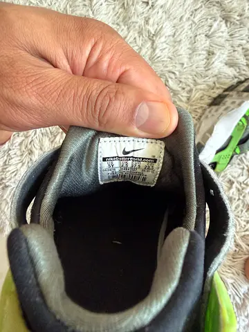 Nike running shoes (single shown) - size tag visible, used