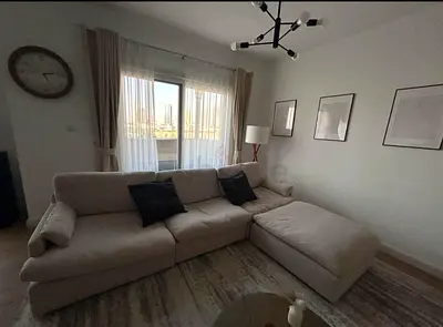 Home Center swin feather filled sofa with footstool