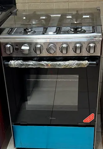 Midea 4-Burner 60x60 Gas Cooker with Oven - Good Working Condition