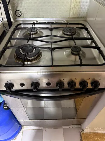 Used 4-Burner Gas Stove with Oven - Stainless Steel