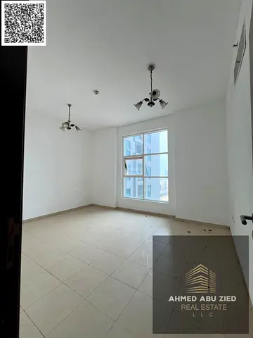 Stylish 2BR apartment, separate hall, 2 baths, 2 balconies open view, central AC, excellent finish, prime location, easy access to Dubai & Sharjah