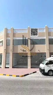 🏢 For Rent – Corner Commercial Building in Al Bustan