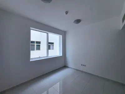 For annual rent in Mushrif, Ajman, Al Ittihad Street: One bedroom and living room, separate hall, two bathrooms. Prime location, close to all services