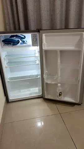 Small single-door refrigerator in good working condition