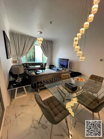Luxurious three-bedroom apartment with a hall and a maid's room, fully furnished with new luxury furniture in Ajman - Al Rashidiya 1 - Oasis Towers