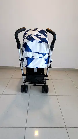 Lightweight navy  white patterned umbrella stroller — good condition