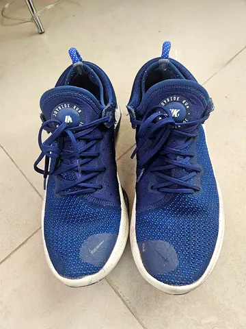 Used navy blue athletic sneakers - size unknown, good overall condition