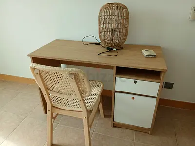 IKEA-style wooden study desk with storage