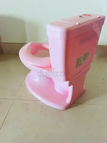 Pink Potty Training Toilet - Lightweight Plastic, Good Condition with flush sound