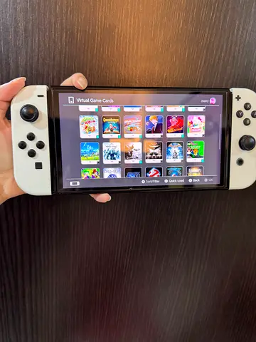 Nintendo Switch OLED with white Joy‑Con — Good condition