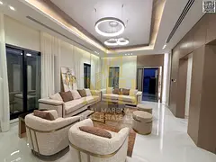Luxury two-story villa with a rooftop terrace, located behind the Saudi German Hospital and near a s