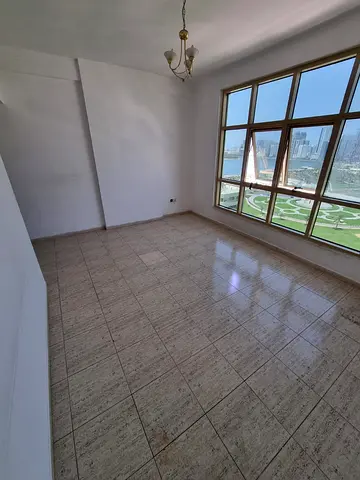 sea view 1 bedroom living room practical layout good space prime location near corniche comfortable and quiet living