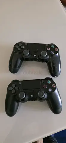 Pair of Sony DualShock 4 Wireless Controllers (Black) - Good Working Condition
