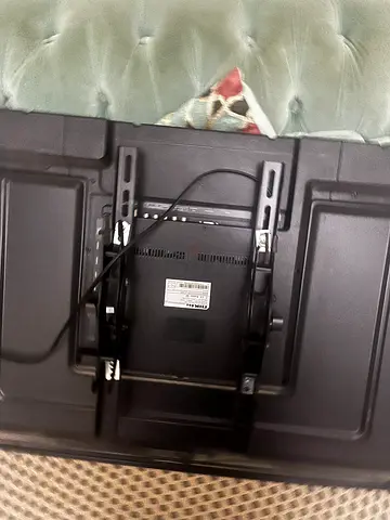 32-40 inch LED TV (used) with wall mount attached
