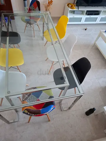 Glass Dining Table with 8 Mixed-Color Chairs