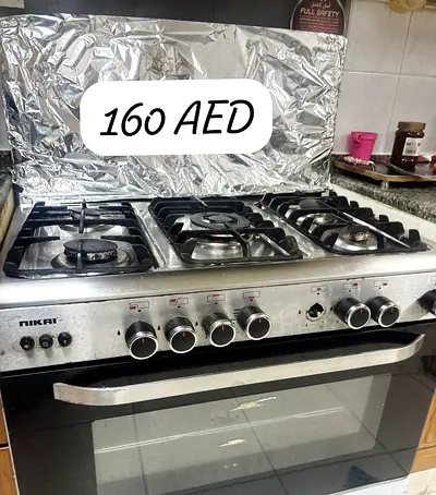 Nikai 5-Burner Gas Stove with Oven - Used, Working