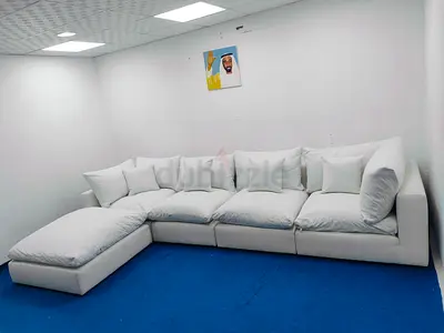 The One Brand modular 5 piece sofa with ottoman