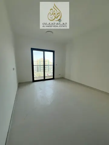 Brand new two bedroom apartment for rent in Sharjah Al Qulaya balcony free parking one month free flexible payment