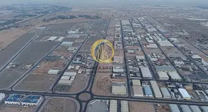 For sale: industrial land in Al-Sajaa Oasis, area 27,000 sq. ft., 36-meter street, ownership: Arabs