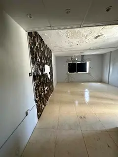 Studio for annual rent in Al Majaz 2, Sharjah, suitable for bachelors, prime location on the main ro
