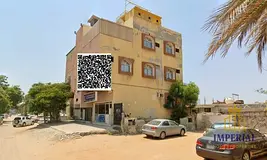 Residential investment plot with a (G+4) building in Liwara 1 – Freehold available to all