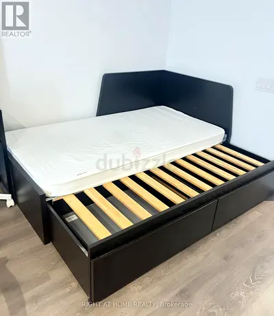Single bed frame with storage drawers and headboard - dark wood