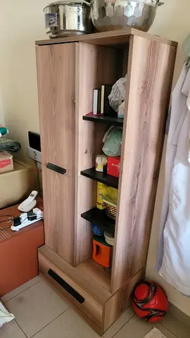 Tall wooden storage cabinet with open shelves and drawer - light oak finish