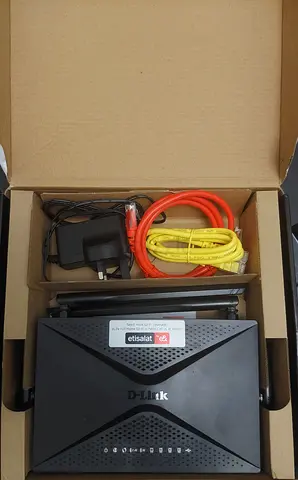 D-Link Wireless Router with Power Adapter and Ethernet Cables