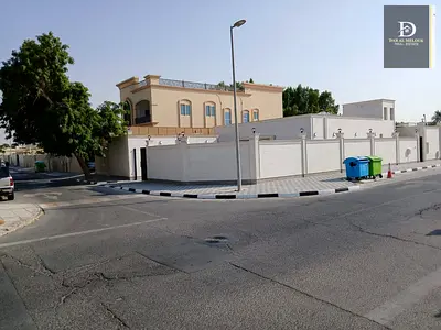 For Sale in Sharjah, Al Mansouri Area: Single-Story Villa Corner plot on two streets Area: 5,086 sq