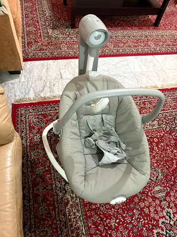 Gently used electric baby swing/rocker in grey - works well