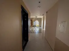 Spacious 2-Bedroom Apartment with Parking in Emirates City – AED 38,000 (4 Cheques)