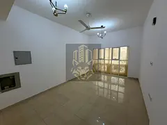One bedroom apartment with living room two bathrooms separate hall and central AC spacious layout in