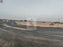 Land for sale including registration fees, main street, large setback