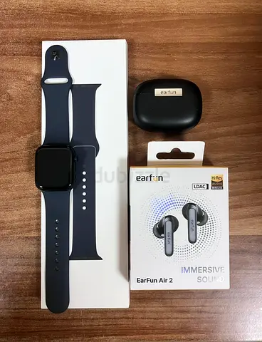 Square smartwatch with black silicone band - used