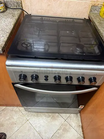 Used freestanding stainless steel gas cooker with oven - good working condition
