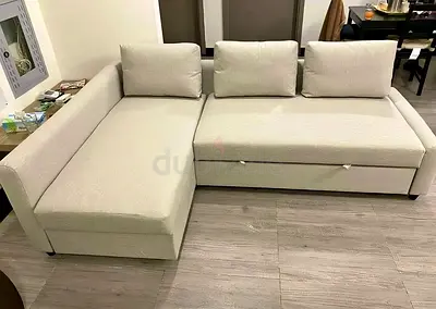 Light beige L-shaped 3-seater sofa with storage, good condition
