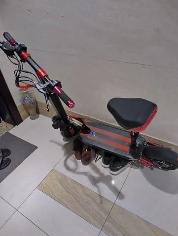 Used electric scooter with seat — good working condition