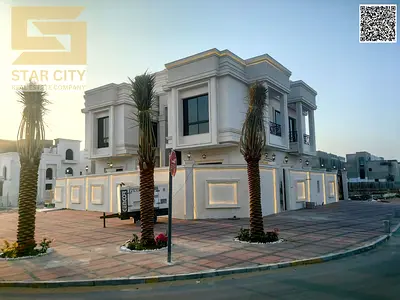 A spacious, luxurious, three-story corner villa for sale in Al Helio 2, Ajman. Opposite a service p