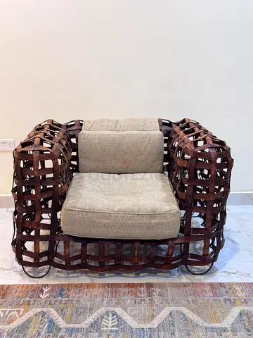 Vintage straps leather arm chair
