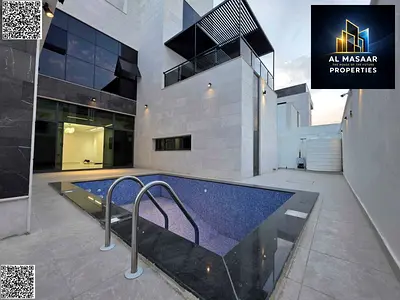 Luxury villa with swimming pool, elevator, air conditioning, electricity, and water, including registration and ownership fees. Brand new, freehold, f