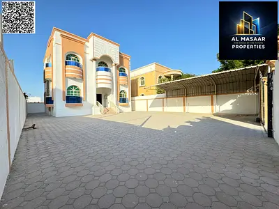 Villa for sale in Al Rawda, Ajman, including electricity, water, and air conditioning. Freehold ownership for all nationalities and inheritable by chi
