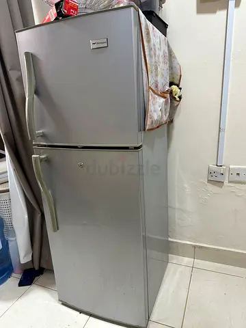 Silver double-door refrigerator (top freezer) - good working condition