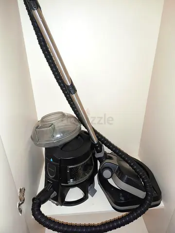 Used cylinder vacuum cleaner - compact canister model