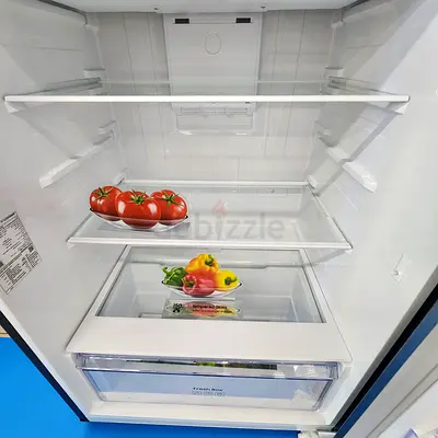 Used Single-Door Refrigerator in Good Working Condition (Interior Shown)