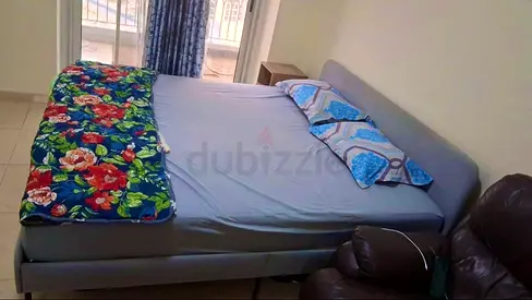 Ikea king size upholstered bed frame - good condition